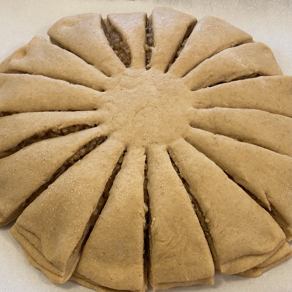dough circle cut in 16 slices